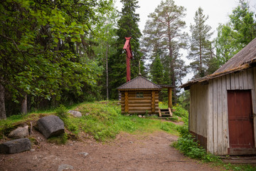 SOLOVKI, REPUBLIC OF KARELIA, RUSSIA - JUNE 27, 2018: Memorial cross in the Holy Ascension skete on Sekirnaya mountain. The Solovetsky Monastery. Solovki Islands, Arkhangelsk region, White Sea © Konstantin