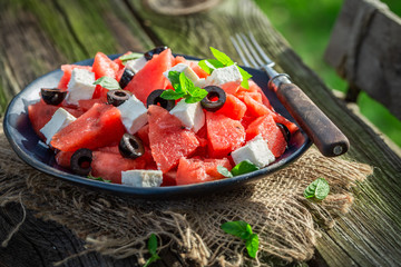 Tasty watermelon salad with black olives and feta cheese