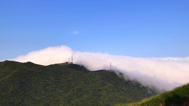 Rewind time lapse photography, Watch the changes in the clouds on the top of the mountain (Yangmingshan) Taipei, Taiwan