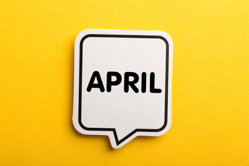 April Speech Bubble Isolated On Yellow