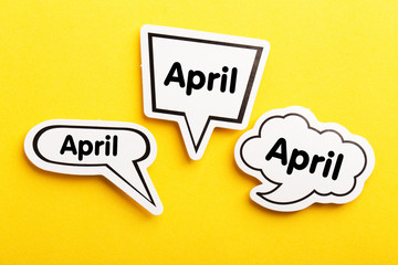 April Speech Bubble Isolated On Yellow