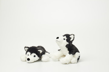 Cute dog doll isolated on white background. (with free space for text) 