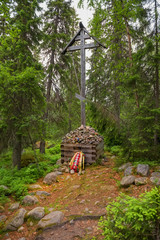 SOLOVKI, REPUBLIC OF KARELIA, RUSSIA - JUNE 27, 2018: Memorial cross in the Holy Ascension skete under the Sekirnaya mountain. The Solovetsky Monastery. Solovki Islands, Arkhangelsk region, White Sea