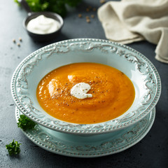 Homemade pumpkin soup with cream