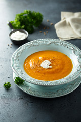 Homemade pumpkin soup with cream