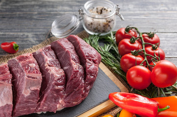 Close-Up Steaks raw Black Angus meat. Fresh meat on a cutting board