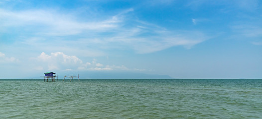 Panoramic seascape with an old fishing house on stilts. Asia, Vietnam, Phu Quoc.