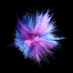 Colored powder explosion. Abstract closeup dust on backdrop. Colorful explode. Paint holi