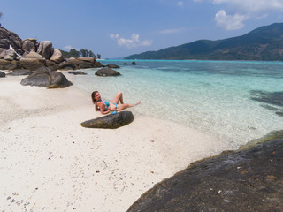 woman on an isolated beach in Andaman sea, Koh Lipe - solo travel