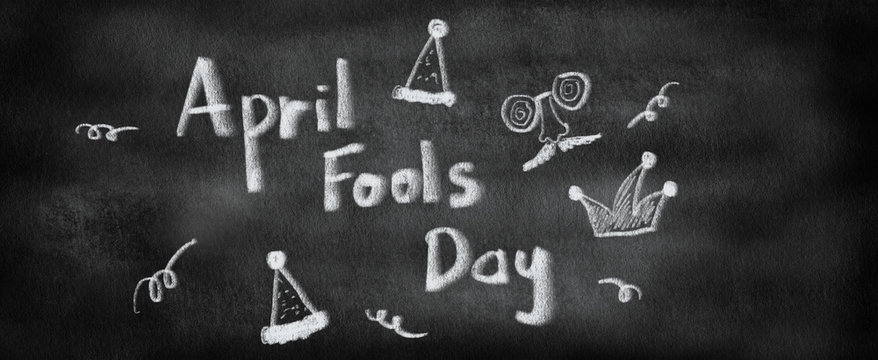 Doodle Of April Fools Day With Cartoon Element On Black Chalkboard Background Concept