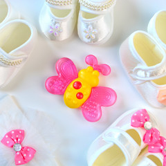 Baby teether and accessories for little girl background