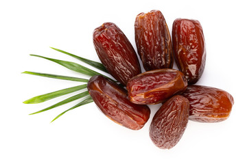 Dry dates isolated on white background. Top view. Flat lay pattern.
