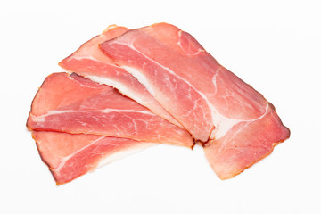 Hamon sliced on white background. Spanisch traditional meat.