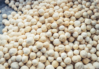 Drained yougurt balls called Kashk for sale on the food market in Shiraz, Iran