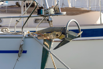 The bow of the ship with an anchor with chain close-up