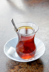 cup of Turkish tea on wooden table