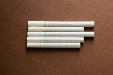 A variety of cigarettes with a white filter. Various tobacco products cigarette with a white filter.