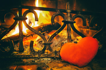 heart in front of the fireplace. the fire. love	