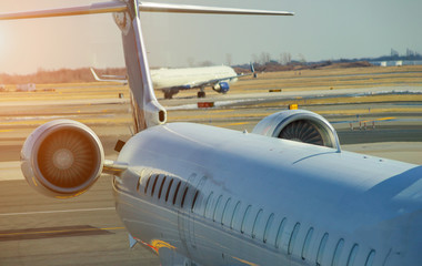 jet engine against a plane at the airport on loading