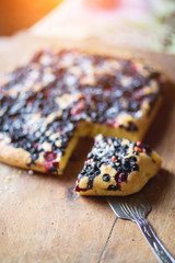 Delicious homemade pie of blueberries and strawberries