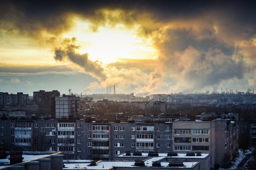 Industrial city sunrise with smoke