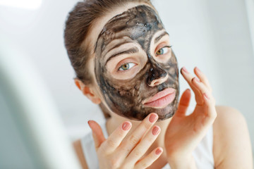 Woman with facial mask 