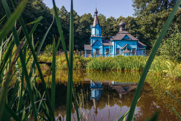 Blue wooden Orthodox Church in Koterka village in Podlasie region of Poland