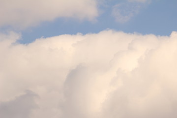 White clouds against the blue sky.