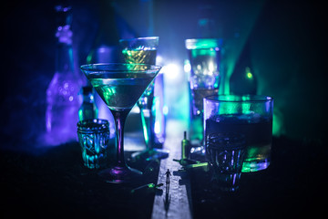 Selection of alcoholic drinks on rustic wood background. Creative artwork decoration