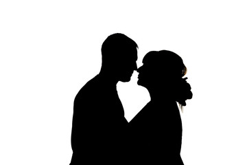 kissing couple. Black silhouettes on white background. In isolation. couple kisses