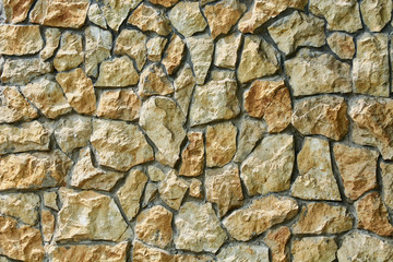 Lined wall made of sharp stones.