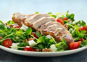 Fresh Grilled Chicken salad with tomatoes, feta cheese