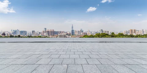 Foto op Canvas Panoramic skyline and modern business office buildings with empty road,empty concrete square floor © MyCreative