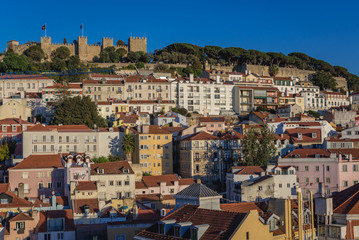 Fototapeta na wymiar Cityscape of Lisbon city in Portugal with Saint George castle on a hill