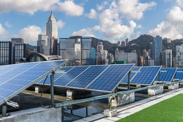 Solar and modern city skyline