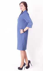 in full growth. stylish female model in the blue dress .plus size.