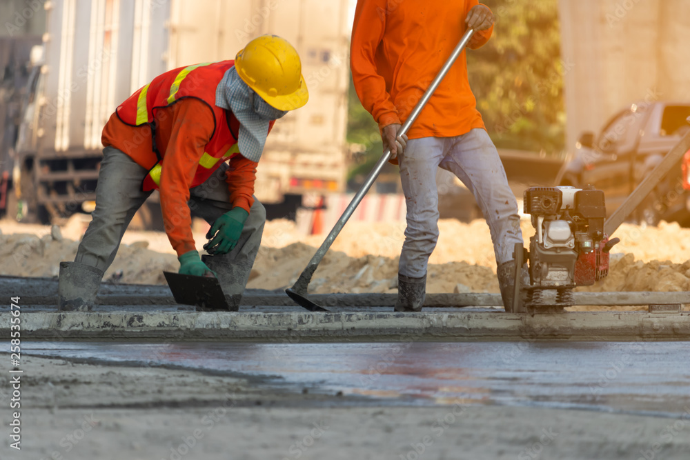 Wall mural concrete road construction workers, construction worker team