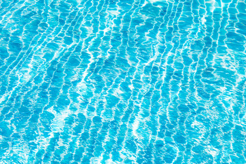 Waving blue water surface. blue clear fresh Water in jacuzzi.