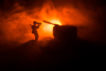 Military soldier silhouette with bazooka. War Concept. Military silhouettes fighting scene on war...
