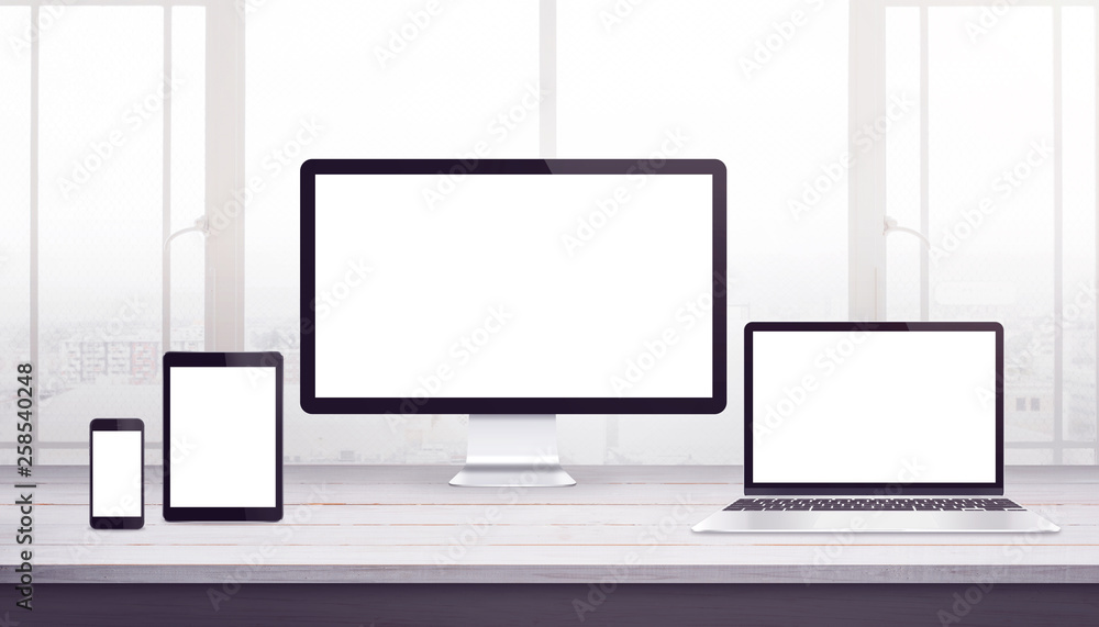 Fototapete Responsive display devices mockup. Work desk, web design studio. Isplated display for web design promotion.
