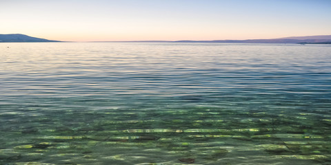 Obraz premium Beach in the coast of Adriatic Sea island Pag, Croatia after sunset