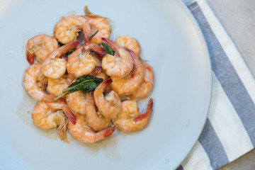 Spicy fried shrimp with basil leaves