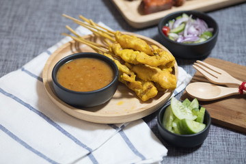 Grilled pork satay with peanut sauce