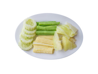 Side dish boiled vegetable with cucumber cabbage baby corn and lentils isolated.