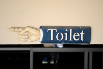 sign in front of wall