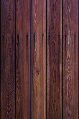 Background texture of old green painted wooden boards fence