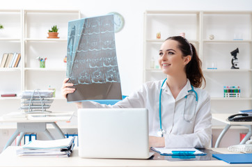 Young female doctor radiologist working in the clinic