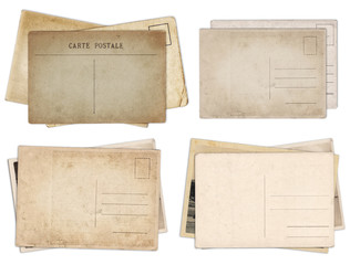 Set of various old vintage postcards isolated on white