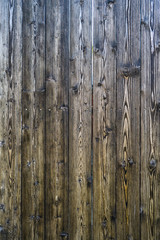 Background texture of old green painted wooden boards fence