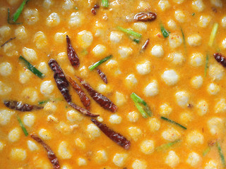 Top view of the curry used to eat with Thai noodles, delicious Thai vermicelli, eat and fresh vegetables.